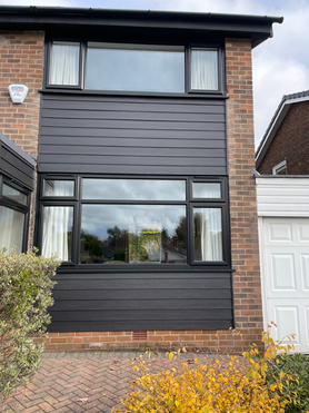 Full House of Black Windows, Composite Doors and Cladding Project image