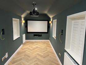 Created a link halway a cosy cinema room Project image