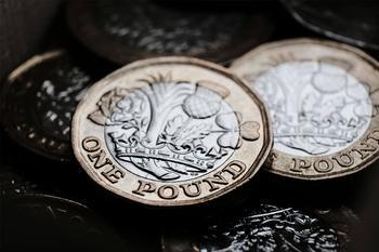 Image of pound coins - cash funding for loft conversion