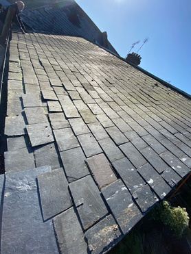 New Spanish slate roof.  Project image