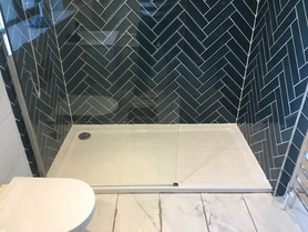 New bathroom with herringbone tiling Project image