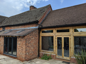 Beautiful single-storey extension with a modern kitchen and utility. Project image