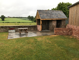 Outhouse Restoration and BBQ Area Project image