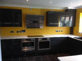 Installation of composite gloss kitchens Project image