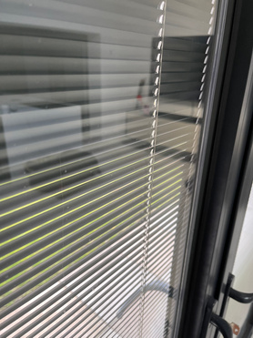 Aluminum 4 Pain Bi-Folds with Grey integral Blinds  Project image