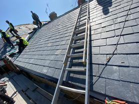 New Spanish slate roof.  Project image