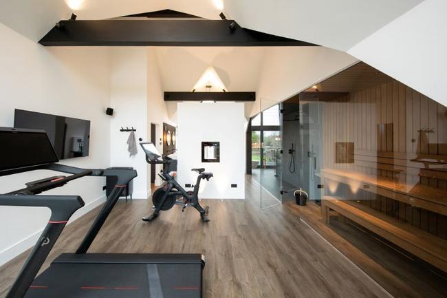 Home gym and sauna by FMB member Bespoke Living Construction Ltd