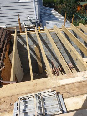 Pitching of roof of another property located Project image