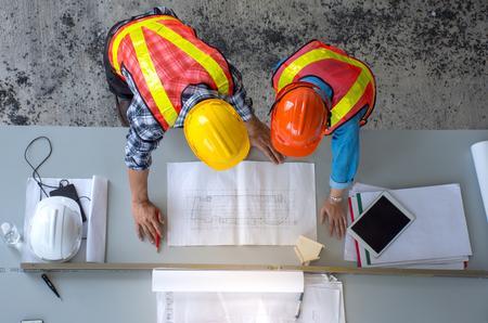 iStock Planning builders with plans.jpg