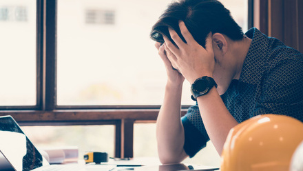 iStock Mental health stressed builder.JPG