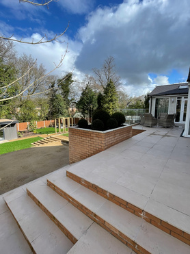 Single story hot tub extension, Porcelain patio & Landscaping Project image