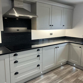 Stunning Kitchen - it’s been a while since anyone’s had black worktops as white is all the rage but these def stand out with the black handles  Project image