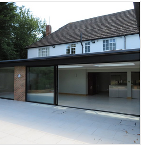 Extension with double glazing doors and patio Project image