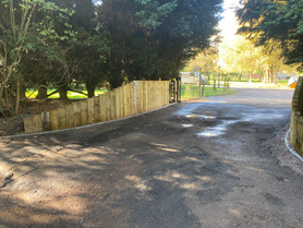 Timber sleeper retaining entrance wall  Project image