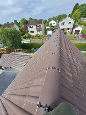 Double Roman Tiled Roof with Bitumen Flat Roofs Project image