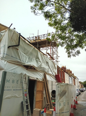 Diathonite External Render to a tradition Coach house in a Conservation Area Project image