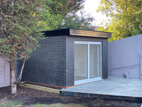 Built Outhouse garden office and landscaping in North London  Project image