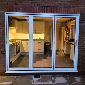 Who doesn't love bi folding doors, the difference they make to a property! Project image
