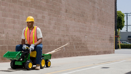 Getty Builder on toy tractor.jpg
