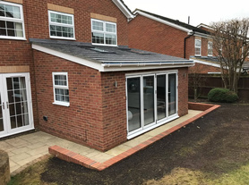 Single storey extension with patio and retaining wall Project image
